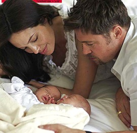 1255015235 brad-angelina-twins-468